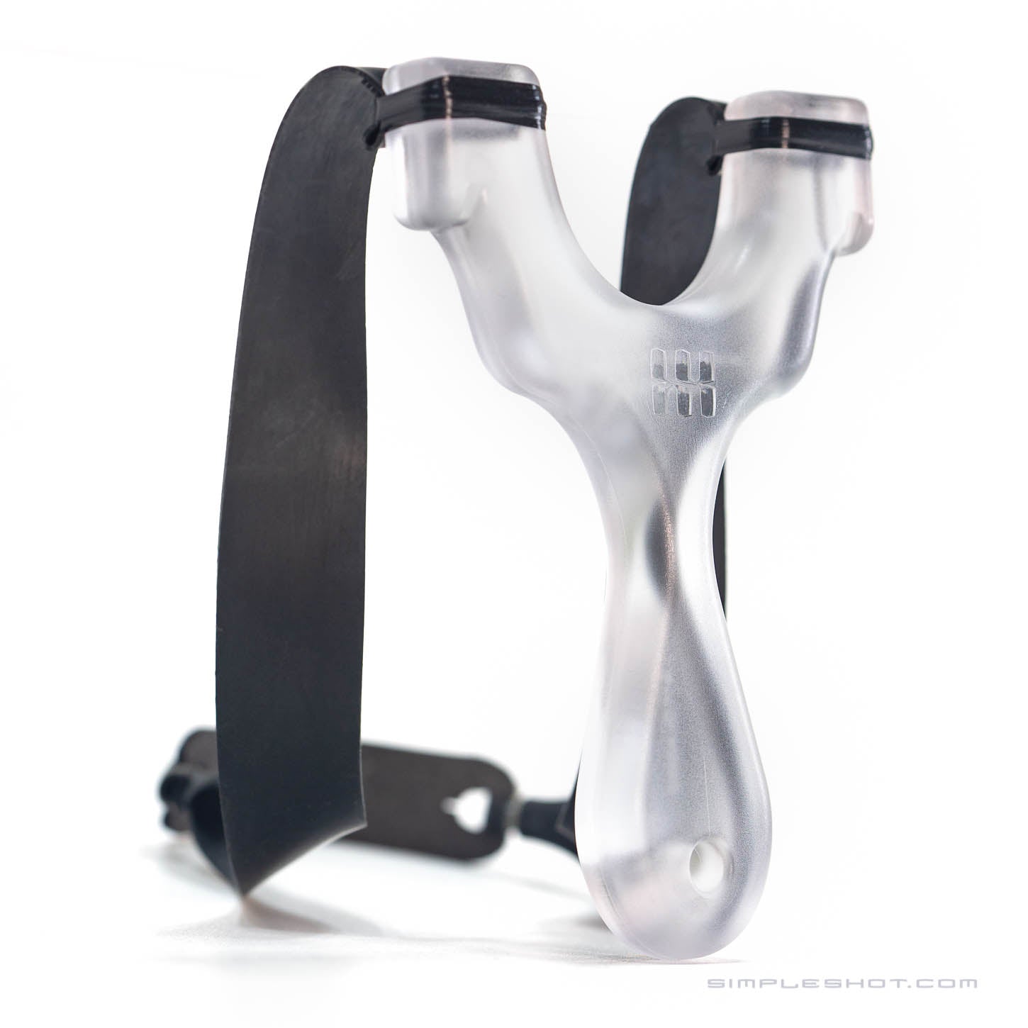 The Axiom Champ slingshot features a clear, compact design with a black elastic band for high-precision shooting. Its handle is ergonomically designed with a finger-friendly grip and has a small brand mark in the middle. Ideal for slingshot enthusiasts, the slightly translucent base adds to its sleek appearance.